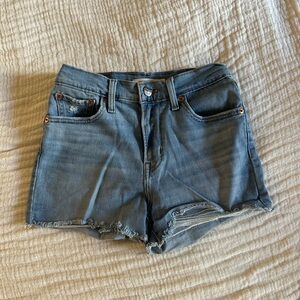 Levi's Blue Jean Shorts with High-Waisted Cut-Off Style